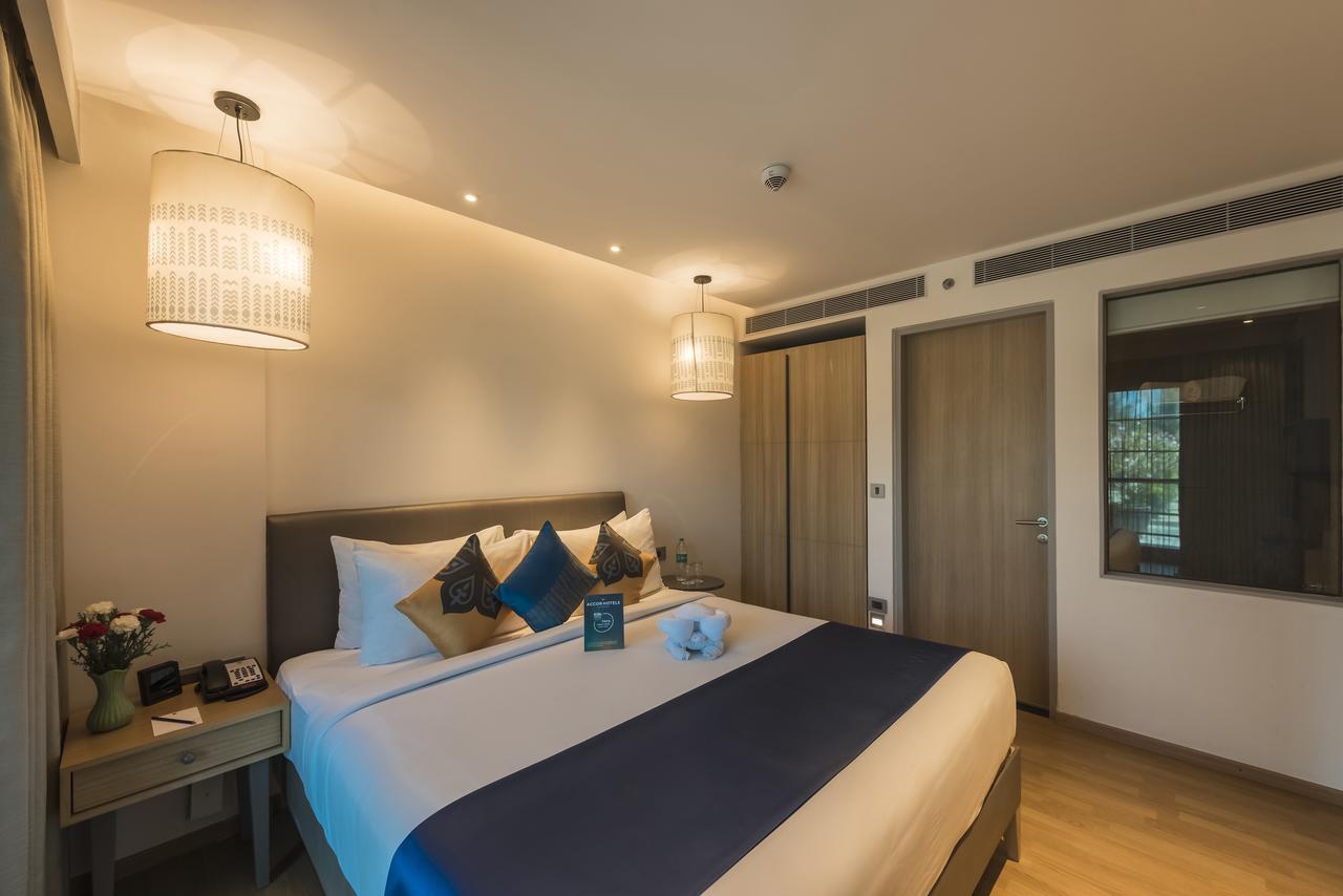Grand Mercure Mysore - An Accor Brand Zewnętrze zdjęcie A bedroom at the hotel